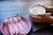 Cappuccino, eclairs and flowers.