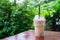 Cappuccino frappe in coffee shop garden