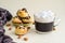 Cappuccino and profiteroles with chocolate icing