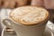 Cappucino latte art - foamy coffee with pattern on top