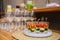 Caprese canapes in shot glasses on a skewer