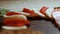 Caprese - italian national dish. Sliced tomatoes and mozarella arranged in shape of Christmas candy cane. Seasoning with