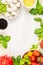 Caprese salad ingredients on white wooden background, top view, place for text