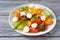 Caprese salad with mozzarella balls