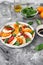 Caprese salad with mozzarella, basil and fresh garden tomatoes. Delicious italian caprese salad with tomatoes, mozarella, basil