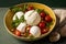 Caprese salad with mozzarella cheese, tomatoes, basil and pine nuts