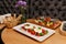 Caprese salad and set of appetizers