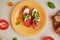 Caprese sandwich appetizer with fresh mozzarella, tomatoes, basil leaves. Italian mediterranean classic recipe close up