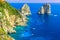 Capri island,beach and Faraglioni cliffs,Italy,Europe