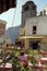 CAPRI, ITALY, 1984 - The pink color dominates among the tables of the bars of the famous Piazzetta di Capri