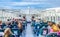 CAPRI, ITALY, MAY 15, 2014: people are sitting on upper deck of a ferry leaving capri island in italy....IMAGE