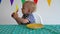 Capricious baby boy throw away apple from plate. Gimbal motion