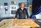 Captain Adolfo Navarro on the bridge of a Ventus Australis expedition ship during cruising Beagle Channel in Chilean Patagonia