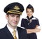 Captain of the aircraft and a beautiful flight attendant in a da