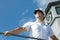 Captain on the gallery of navigation bridge of ship