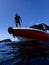 A captain scuba dive on boat.