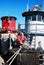 A captain ties his tugboats to a bollard