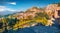 Captivatin summer view of Taormina town and Etna volcano on background. Beautiful world of Mediterranean countrys. Splendid mornin