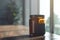 A captivating amber glass jar exudes a warm glow