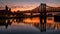 Captivating cityscape with illuminated bridge and stunning reflection on river evening sunset