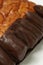 Captivating close-up: Chocolate banana pastry featuring a rich blend of sweet banana cream and chocolate