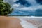 Captivating deserted beachscape with a radiant sun in a clear sky in Ghana, Africa