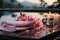 Captivating front view of a wellness paradise, spa stones, pink flowers, towels