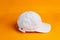 A captivating mockup image showcases the understated elegance of a white blank hat
