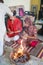 Captivating moment of Indian married couple participating in traditional Pooja and Hawan ceremony with a Pandit chanting mantras