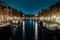 Captivating Night in Amsterdam: A Mesmerizing Long Exposure Photo of Amsterdam's Nighttime Canals