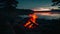 A captivating photo capturing the mesmerizing reflection of a campfire as it lights up the surrounding water, View of campfire