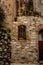 Captivating Photo of a Typical Italian Old Stone House Barred Window in Rocca Imperiale