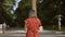 Captivating portrait of a beautiful hispanic woman capturing a picture of the historic meiji shrine\\\'s torii with her mobile phone