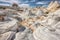 A captivating shot of the White Pocket rock formation in the National Park, with its stunning white sandstone and intricate