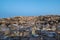 Captivating skyline of Amman, Jordan traditional houses atop a picturesque hill during blue hour