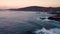 Captivating Sunset Over The Sea In A Coruna, Spain. aerial pan right