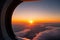 Captivating Sunset View from Airplane Window: A Spectacular Journey.