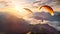 Captivating Video of two paragliders flying elegantly over a picturesque mountain as the sun sets in the background, Paragliders