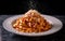 Capture the essence of Tagliatelle Al RagÃ¹ in a mouthwatering food photography shot