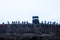 Captured by enemy concept. Military silhouettes and crowd on war fog sky background. World War Soldiers and armored vehicles