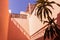 Capturing the Timeless Charm of an Egyptian Hotel\\\'s Terracotta Interior, Palm Trees, Arches, and Sunlit