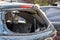 A car after an accident with a broken rear window. Broken window in a vehicle. The wreckage of the interior of a modern car after