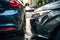 Car accident of two cars, collision of cars. Two cars are damaged after a head-on collision, a car accident. Car accident on the