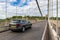 Car approaching toll gate at Clifton Suspension Bridge, UK