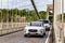 Car approaching toll gate at Clifton Suspension Bridge, UK