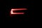 Car back lights shining. Close up detail on one of the LED red taillight modern luxury car. Exterior detail automobile