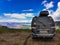 A car on the background of a view of the Matlas plateau. Khunzakhsky district. Dagestan Russia 2021