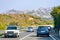 Car with bicycle in road in Costa Smeralda