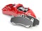 Car brakes. Red caliper and pads. Dsk braking system parts