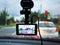 Car camcorder display. Video recorder to record the traffic situation while driving your car.